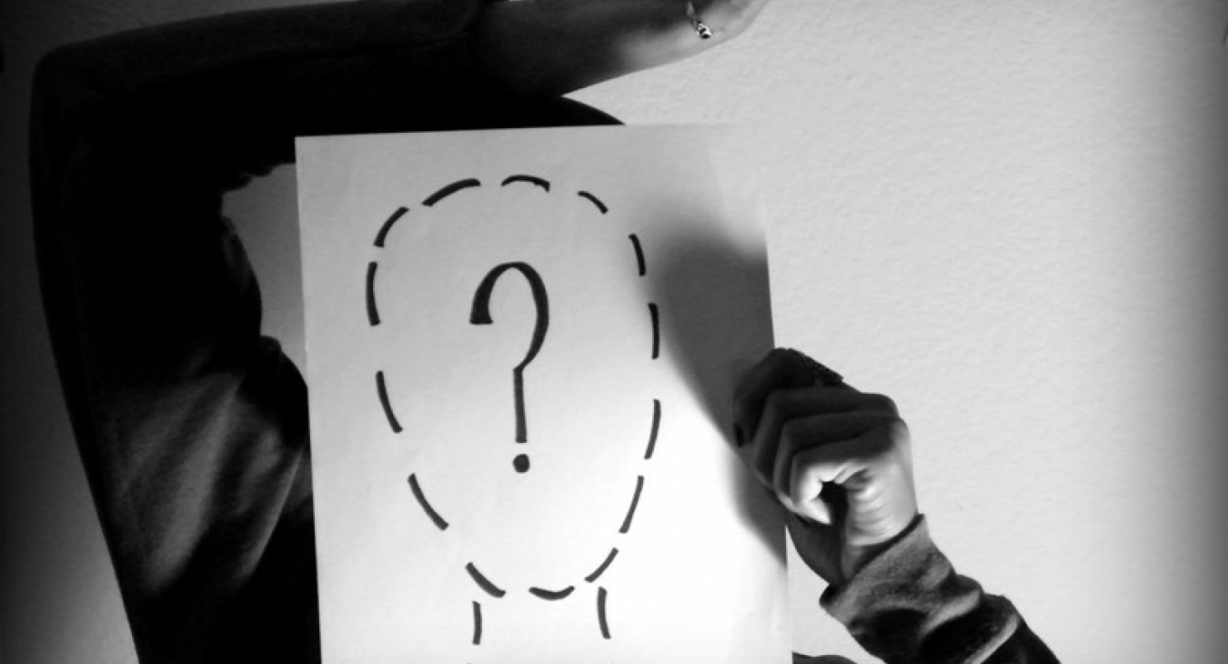 drawing of face with question mark